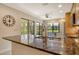 Kitchen with granite countertops, stainless steel appliances, and eat-in breakfast nook at 5230 Landings Blvd # 101, Sarasota, FL 34231