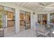 Spacious screened patio with access to kitchen and living spaces at 5230 Landings Blvd # 101, Sarasota, FL 34231