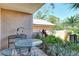 Patio area with seating and garden at 5230 Landings Blvd # 101, Sarasota, FL 34231