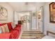 Comfortable sitting room showcases an open layout leading to other living spaces and outdoor access at 5230 Landings Blvd # 101, Sarasota, FL 34231