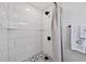 Modern walk-in shower with black hardware, and white subway tile at 5231 32Nd E St, Bradenton, FL 34203