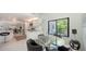 Bright dining area featuring white tile floors and a black framed window at 5324 Siesta Ct, Sarasota, FL 34242