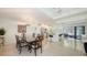 Spacious dining area showing bright open floor plan with natural light and ample entertaining space at 5324 Siesta Ct, Sarasota, FL 34242