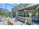 A patio boasts two levels with a spiral staircase and several seating and dining options at 5324 Siesta Ct, Sarasota, FL 34242