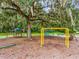 A lovely outdoor playground with swings, slides, and climbing features, perfect for Gathering fun at 5354 Myrtle Wood # 50, Sarasota, FL 34235