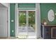 Sliding glass doors lead to the backyard patio, offering seamless indoor-outdoor living at 5554 Blue Azure Dr, Wimauma, FL 33598