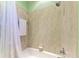 Bathroom with a tiled tub and shower combo at 5616 90Th Avenue E Cir, Parrish, FL 34219