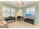 Bright living room featuring neutral decor, plantation shutters and comfortable seating area at 5616 90Th Avenue E Cir, Parrish, FL 34219