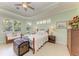 Relaxing bedroom with natural light, neutral colors, and comfortable furnishings at 5616 90Th Avenue E Cir, Parrish, FL 34219