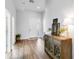 Bright entryway with neutral walls, wood floors, decorative furniture, and a welcoming ambiance at 5919 100Th E Ave, Parrish, FL 34219