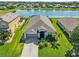 Well-maintained home features lush landscaping and a cozy front porch at 5919 100Th E Ave, Parrish, FL 34219