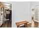 A large walk-in closet featuring custom shelving, hanging rods, and storage space at 5919 100Th E Ave, Parrish, FL 34219