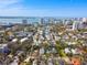 Aerial real estate showcasing a neighborhood with mature trees, proximity to the bay, and city views at 652 Ohio Pl, Sarasota, FL 34236
