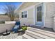Cozy front porch area with comfortable chairs, stylish flooring, and inviting entryway at 652 Ohio Pl, Sarasota, FL 34236
