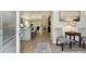Open-concept kitchen with a large island, modern pendant lighting, and seamless connection to living spaces at 652 Ohio Pl, Sarasota, FL 34236