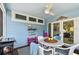 Cozy porch with comfortable seating, ceiling fan, and charming decor at 652 Ohio Pl, Sarasota, FL 34236