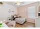 Cozy bedroom with a plush bed, soft lighting, and stylish decor, perfect for restful nights at 6838 44Th E Ter, Bradenton, FL 34203