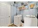 Well-lit laundry room with modern washer and dryer at 6838 44Th E Ter, Bradenton, FL 34203