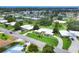 Overhead view of a residential neighborhood highlighting well-kept landscaping and diverse home styles at 7114 11Th W Ave, Bradenton, FL 34209