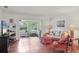 Cozy living room with tiled floors, comfortable seating, and view to the lanai at 7114 11Th W Ave, Bradenton, FL 34209