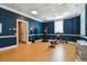 Well-equipped gym featuring a punching bag, weights, workout bench, and ample space for exercise at 750 N Tamiami Trl # 1203, Sarasota, FL 34236