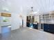 Well-lit room featuring custom bar area, stylish cabinetry, and modern appliances at 763 Siesta Dr, Sarasota, FL 34242