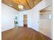 This primary bedroom boasts wood floors and access to the ensuite bathroom and walk-in closet at 763 Siesta Dr, Sarasota, FL 34242