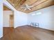 Bedroom featuring hardwood floors, a wood paneled ceiling, and lots of natural light at 763 Siesta Dr, Sarasota, FL 34242