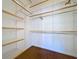 Walk-in closet with an abundance of shelving at 763 Siesta Dr, Sarasota, FL 34242