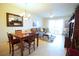 Open living and dining room area with tile flooring and neutral paint at 7803 Grand Estuary Trl # 205, Bradenton, FL 34212