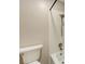 Bathroom including a toilet, and tub and shower with white tile walls at 811 Oak Dr # 811, Bradenton, FL 34210