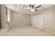 Bedroom featuring carpet, a ceiling fan, neutral walls and a closet with white doors at 811 Oak Dr # 811, Bradenton, FL 34210
