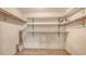 Spacious walk-in closet with shelving and tiled flooring at 811 Oak Dr # 811, Bradenton, FL 34210