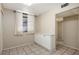 Bright dining room featuring tile flooring, white cabinetry, and window at 811 Oak Dr # 811, Bradenton, FL 34210