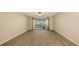 Spacious living room with hardwood floors leading to the screened in porch at 811 Oak Dr # 811, Bradenton, FL 34210
