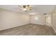 Inviting living room featuring wood floors, ceiling fan, and neutral tones at 811 Oak Dr # 811, Bradenton, FL 34210