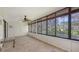 Enclosed lanai features beautiful views, ceiling fan and tile flooring at 811 Oak Dr # 811, Bradenton, FL 34210