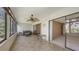 Enclosed porch with comfortable seating, windows, and access to living areas at 811 Oak Dr # 811, Bradenton, FL 34210