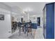 Open concept dining area adjacent to the kitchen, perfect for entertaining guests at 845 Benjamin Franklin Dr # 106, Sarasota, FL 34236