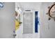 Hallway with modern decor leading to a dining area at 845 Benjamin Franklin Dr # 106, Sarasota, FL 34236