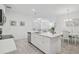 Spacious kitchen featuring a large island, ample counter space, and modern appliances for culinary enthusiasts at 8553 Whispering St, Sarasota, FL 34240