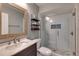Clean, updated bathroom with a glass enclosed shower, modern vanity and sleek fixtures at 901 Gulf S Dr # 3, Bradenton Beach, FL 34217