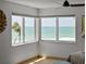 Windows with bright, breathtaking ocean views enhance this home and invite the outdoors in at 9265 Blind Pass Rd, Sarasota, FL 34242