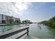 Scenic water view featuring kayakers enjoying a peaceful day on the canal at 9265 Blind Pass Rd, Sarasota, FL 34242