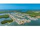 Expansive aerial view of a waterfront residential community with a beautiful landscape and open water access at 10008 Spoonbill E Rd, Bradenton, FL 34209