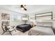 Cozy bedroom featuring unique bunk beds, comfortable mattresses, and ample natural light at 10008 Spoonbill E Rd, Bradenton, FL 34209
