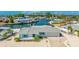 Charming waterfront home with well-maintained landscaping, private dock, and beautiful canal views at 10008 Spoonbill E Rd, Bradenton, FL 34209