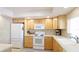 Functional kitchen featuring a full suite of appliances and ample counter space at 10008 Spoonbill E Rd, Bradenton, FL 34209
