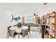 Open-concept living area with dining table and spacious sitting area at 10008 Spoonbill E Rd, Bradenton, FL 34209