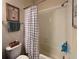 Bathroom featuring a shower/tub with tiled walls and a shower curtain at 10934 79Th E St, Parrish, FL 34219